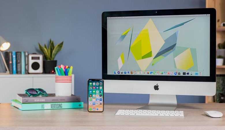 Apple, Lansmandan Önce iMac Yapılandırmalarını Kaldırıyor 3 21 5in imac with iphone 22 thumb800